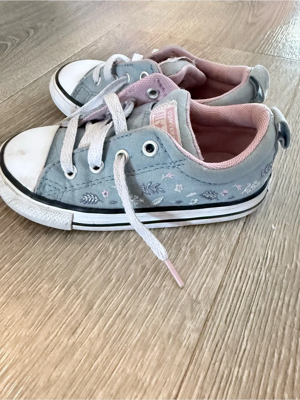 Converse Kids Light Blue and Pink Low Top Sneakers with floral accents